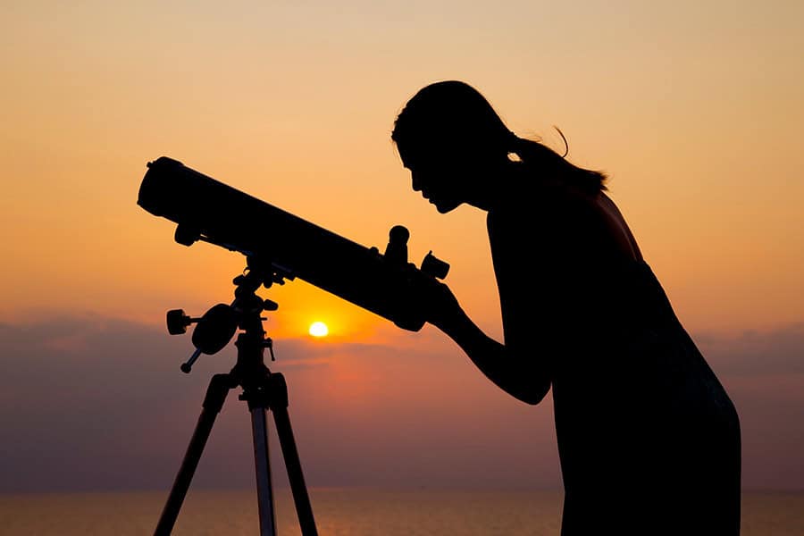 woman with telescope